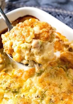 a spoon full of chicken and cheese casserole