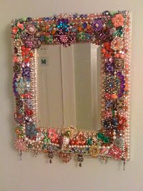 a mirror that has some beads on it