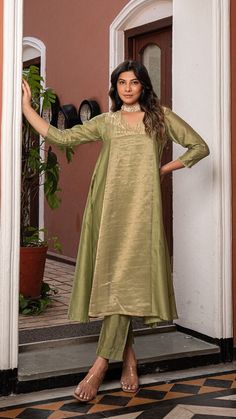 Green Golden Tissue Chanderi Anarkali Kurta Set, Kurta pant set Anarkali dresses, Indian wedding outfit Bring on the festive spirit with our anarkali kurta set in pure tissue and chanderi silk. Panelled Anarkali Kurta with separate inner and matching cotton silk pants. Kurta Fabric : Pure Tissue + Chanderi Silk. Pants : Cotton Silk. Dupatta : Pure Tissue. Colour : Light Green. Model height is 5.6" and is wearing a size S. Wash Care : Dry Clean Only. This product will be exclusively handcrafted f Tissue Anarkali Dress, Diwali Tissue Silk Dress With Dabka Embroidery, Tissue Silk Anarkali Set With Zari Work, Floor-length Tissue Silk Salwar Kameez For Eid, Unstitched Raw Silk Anarkali Set For Festive, Festive Unstitched Raw Silk Anarkali Set, Floor-length Tissue Silk Salwar Kameez With Zari Work, Floor-length Tissue Silk Kurta With Resham Embroidery, Anarkali Tussar Silk Wedding Sets