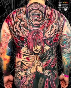 a man with many tattoos on his back