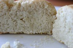 a half eaten piece of bread sitting on top of a table