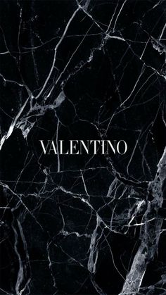 a black marble wall with the word valentine in white on it's bottom corner