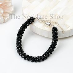 """They Measure around 3.5 mm Hole Size - .40mm  Stone - Black Spinel Shape - Round Total Bracelet Weight -82cts Bracelet Length -17Cm" You can choose any material - 18K Gold Plated or 925 Sterling Silver ------------- *We will add free Box for jewelry.  *Before Purchase, Please Check all Photos and description measurement. Your Satisfaction is My Priority    Still, You Have Any Confusion Regarding This Necklace, Please Feel Free to Ask Me Anything at Any time. I Will Feel Good to Solve your Pro Black Stretch Bracelet With Faceted Round Beads, Elegant Black Faceted Bracelet, Cheap Hand-strung Black Beaded Bracelets, Black Heart-shaped Adjustable Beaded Bracelets, Black Round Gemstone Beads, Lock Bracelet, Magnetic Lock, Valentines Day Gifts For Her, Black Spinel