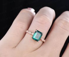 - Metal: Solid gold(10K/14K/18K white/yellow/rose gold),925 sterling silver,platinum available- Main Stone: 7x9mm emerald cut lab treated emerald- Accent Stone: natural conflict free diamonds,SI-H Clarity and Color- Can be personalized: Yes Heirloom Emerald Cut Emerald Ring For Promise, Rose Gold Emerald Ring For Anniversary, Heirloom Emerald Cut Promise Ring, 14k Gold Emerald Cut Emerald Ring For Wedding, Emerald Diamond Ring In Rose Gold, Emerald Ring With Rose Cut Diamonds For Formal Occasions, Art Deco Emerald Cut Emerald Ring For Promise, Art Deco Emerald Cut Emerald Promise Ring, Classic Rose Gold Emerald Ring For Wedding