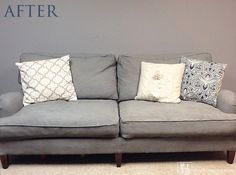 a gray couch with pillows on it in front of a sign that reads, before and after