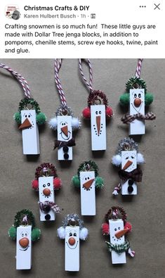 snowmen are hanging from the top of paper tags with candy canes on them