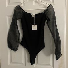 Size Extra Small Body Suit. Boutique Brand. Casual Black Bodysuit For Fall, Casual Black Bodysuit For Parties, Chic Stretch Black Bodysuit, Chic Black Stretch Bodysuit, Casual Fall Party Bodysuit, Trendy Black Bodysuit For Fall, Trendy Bodysuit For Spring Going Out, Trendy Bodysuit For Going Out In Spring, Chic Black Bodysuit For Fall