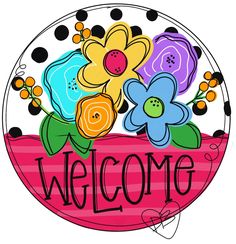 a welcome sign with flowers on it and the word welcome written in large letters below