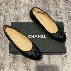 Chanel Classic Ballet Slippers Flats In Leather With Patent Leather On The Tip. Worn 2 Times. Excellent Condition, Aside From The Bottom Showing Slight Signs Of Wear. Comes With Original Box Which Is In Perfect, Mint Condition. Purchased From Hirshleifer’s In Manhasset, Ny From The Shoe Department For Full Price Plus Tax (This Classic, Staple Shoe Will Never Be Found On Sale Or Discounted). Classic Black Ballet Flats With Rubber Sole, Black Closed Toe Flats For Galas, Classic Black Almond Toe Ballet Flats, Designer Black Ballet Flats With Leather Sole, Classic Black Ballet Flats Medium Width, Black Flats With Rubber Sole For Galas, Luxury Black Ballet Flats, Luxury Ballet Flats For Evening, Classic Black Patent Leather Ballet Flats