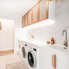 a washer and dryer in a small room