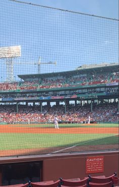 a baseball game in progress with the batter up to plate