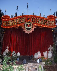 the theatre is decorated with halloween decorations and lights