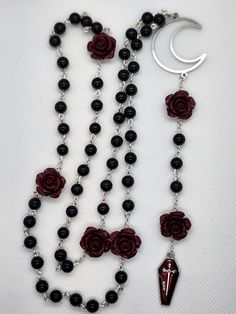 Gothic styled rosary necklace madefrom cinnabar roses and onyx 6mm stones. Perfect for everyday goth wear or for Halloween 🎃 Vampire Core Jewelry, Trad Goth Jewelry, Rose Symbolism, Goth Rosary, Gothic Rosary, Everyday Goth, Vampire Jewelry, Rosary Style Necklace, Gothic Jewellery