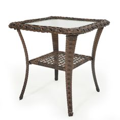 a wicker side table with glass top