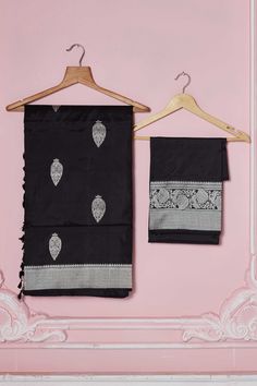 Beautiful black Banarasi saree with silver zari border is a perfect choice for festive occasions. It comes with a blouse piece. Disclaimer: The shown stitched blouse on the model is for display purpose only. The saree comes with a matching blouse piece and finished with fall and piko. Latest Designer Sarees, Fashion Journals, Traditional Fabric, Banarasi Sarees, Blouse Piece, Blouse Dress, Fashion Store, Saree Designs, Indian Fashion