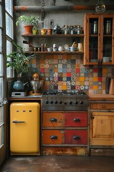 an old fashioned kitchen with colorful tiles on the wall