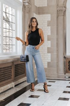 These trendy Light Wash Wide Leg Crop Jeans are a must-have for spring! Features a high rise waist, a wide leg silhouette, front & back pockets, a cropped length, and a button zip fly closure. Style them with a basic tank top or bodysuit along with strappy high heels for a chic day to night outfit! Be sure to complete the look with simple gold jewelry and a matching crossbody. Simple Gold Jewelry, Wide Leg Jeans Cropped, Crop Top With Jeans, Strappy High Heels, Ribbed Tank Top, Colors Green, Ribbed Tank Tops, Crop Jeans, Ribbed Tank