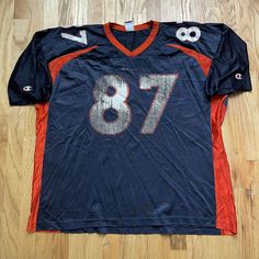 Jersey is in good to fair condition overall has no major rips stains or tears but has some major fading/cracking (pictured above) Fits true to size men's 52 (2XL) Blue Jersey, Castle Rock, Denver Broncos, Mens Graphic Tee, Vintage Men, Denver, Mens T, Overalls, Mens Graphic