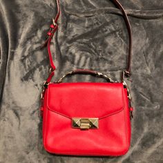 Ann Taylor Lady Bag In Red, Nwt (New With Tags) Original Retail Price $178 The Perfect Leather Structured Bag In Red With Gold Hardware! Has Upper Handle, Cross-Baby (Messenger) Strap, 2 Phone Pockets And Inside Zip Pocket. The Pyramid Gold-Tone Clasp Adds A Nice Touch To The Simple Bag. Questions? Leave A Comment Below! Designer Red Flap Bag For Daily Use, Red Top Handle Flap Bag For Shopping, Designer Red Bag With Adjustable Strap, Designer Red Satchel With Adjustable Strap, Designer Red Flap Bag For Shopping, Red Flap Bag For Shopping, Red Everyday Top Handle Flap Bag, Red Top Handle Flap Bag For Everyday Use, Red Top Handle Flap Bag With Detachable Strap