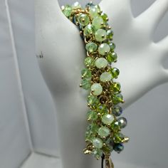 Ali Khan Beaded Bracelet With Gold Links. Color Aqua-Green-Seagrass Beads Total Length 8 Inches Green Beaded Chain Bracelets For Beach, Green Beaded Chain Bracelet For Jewelry Making, Green Beaded Chain Bracelets For Jewelry Making, Bohemian Green Crystal Bracelet For Beach, Elegant Adjustable Beaded Bracelets With Dangling Beads, Green Beaded Bracelet With Round Beads, Green Beaded Bracelets With Round Beads, Bohemian Green Beaded Crystal Bracelet, Elegant Faceted Beads Bracelets For Beach