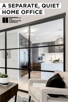 a living room and kitchen area with glass doors