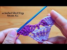 someone is crocheting an object with yarn