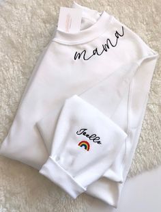 Mama Sweatshirt / Embroidered Mama Sweatshirt / Rainbow Baby | Etsy White Long Sleeve Top With Custom Embroidery, White Winter Top With Embroidered Text, White Embroidered Text Top For Winter, White Embroidered Top For Winter, Cute White Embroidered Sweatshirt, White Cotton Sweatshirt With Embroidered Text, White Cotton Sweatshirt With Custom Embroidery, White Long Sleeve Sweatshirt With Letter Embroidery, White Embroidered Basic Top