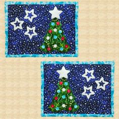 two quilted christmas trees with stars on them