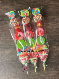 candy lollipops with sprinkles and candies in cello bags