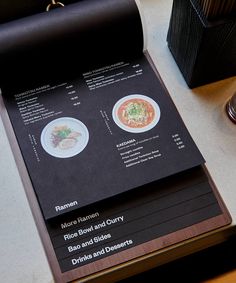 a menu sitting on top of a wooden table