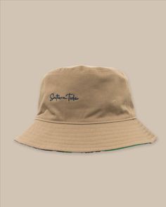 The front view of the Southern Tide Beach Blooms Bucket Hat by Southern Tide - Khaki Bucket Hat Beach, Reversible Bucket Hat, Summer Staples, Bold Color, Snapback Hats, Bold Colors, Your Style, Bucket Hat, Floral Pattern