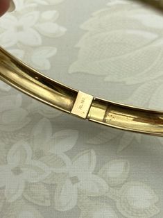 Stamped 10k Exact Vintage circa Unknown Textured  7.5 inches long 3.5g We will insure your package for full value  Feel free to message us with any questions Classic Hinged 14k Gold Bracelet, Classic 14k Gold Hinged Bracelet, 14k Gold Hinged Bracelets As Gift, Hinged 14k Gold Bracelet For Formal Occasions, Vintage 14k Stamped Gold Bangle Bracelet, Vintage 14k Gold Hallmarked Bangle, Vintage Yellow Gold Hinged Bracelet, Classic 14k Stamped Gold Bangle Bracelet, Engraved Yellow Gold Bracelet Collectible