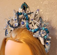 Mermaid Crown.Seashell headpiece.Silver,blue seashell headband with rhinestones and bead detail.Halloween,Costume.Fairy,Cosplay headpiece.Beach wedding,Fairytale wedding. Blue Whimsical Costume Hats And Headpieces, Silver Fantasy Headpiece For Costume Party, Blue Costume Hat For Carnival, Adjustable Blue Costume Accessories For Costume Party, Silver Crown Headpiece For Costume Party, Adjustable Silver Costume Hats And Headpieces, Adjustable Blue Costume Accessories For Cosplay, Themed Blue Costume Hats And Headpieces, Handmade Headband For Costume Party