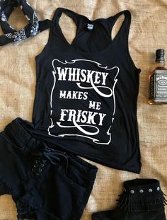 Whiskey Makes Me Frisky's 95% rayon and 5% spandex blend creates a luxuriously soft, lightweight tank top, ideal for layering or just enjoying the summer. Featuring bold screen-printed design on the front and a sleek A-line cut, this top stretches to fit without ever shrinking! Model is 5'10" with measurements of 33" 25" 34", wearing a size small. Size Chart TRUE TO SIZE PREMIUM FABRIC MADE IN THE U.S.A.🇺🇸 Our guarantee to you: If you are not 100% satisfied with your purchase, you can return y Fitted Racerback T-shirt For Summer, Fitted Tank T-shirt For Summer, Summer Stretch Vest With Graphic Print, Trendy Summer Vest With Letter Print, Stretch Cotton Printed Tank Top, Printed Stretch Cotton Tank Top, Trendy Printed Tank Top, Fitted Letter Print Tank Vest, Fitted Tank Vest With Letter Print