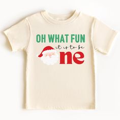 Celebrate your little one's special day with our Oh What Fun It Is To Be One 1st Birthday Shirt! Perfect for a Christmas-themed first birthday party, this festive shirt adds a joyful touch to your celebration. Designed for comfort and style, it's the ideal choice for a cake smash photo session. Make your child's first birthday unforgettable with this charming Christmas Oh What Fun First Birthday Cake Smash Outfit. Grab yours today and capture the magic of the season and the joy of turning one! + Christmas Theme First Birthday, Christmas 1st Birthday, 1st Birthday Shirt, First Birthday Cake Smash, 1st Birthday Shirts, Oh What Fun, First Birthday Cake, Turning One, Charming Christmas