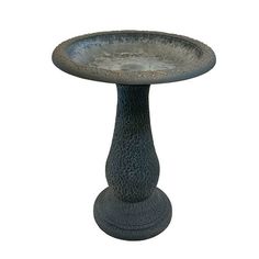 a black pedestal with a white background