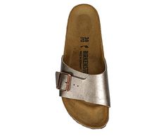 Birkenstock Catalina Women s Footbed Sandal Reimagined design for next-gen style in the Birkenstock Catalina women s footbed Sandal. With a Birko-Flor faux leather upper featuring a single strap with an adjustable buckle for simplicity, this Slip-On also has a smooth suede lining. The cork-latex footbed cradles your foot, while the EVA outsole offers some traction. Birkenstock uses natural & renewable materials with a focus on environmentally friendly operations. Slip-On Suede Casual Gold Slides With Buckle Closure, Adjustable Slippers With Leather Footbed, Gold Slides With Textured Footbed, Gold Footbed Sandals With Removable Insole, Casual Gold Footbed Sandals With Removable Insole, Comfortable Slip-on Footbed Sandals, Closed Toe Slides With Cork-bed Midsoles, Casual Footbed Sandals With Arch Support, Comfortable Slide Footbed Sandals