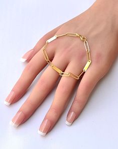 This 14-karat Solid yellow gold Paperclip cable chain bracelet features three links alternating with a bar, which is the ideal for customizing with engraved or stamped initial. The long links resemble paperclips and create a streamlined look. ★ ★ ★ The bracelet consist of -3.8mm 14k Solid Gold Cable link with Lobster clasp, -14.4 x 3.6mm 14k solid gold bar attach, -Total length is 7"  -Link Length: 0.59" (14.99mm) IT comes with beautiful jewelry gift box. MORE SOLID GOLD AND DIAMOND JEWELRY  htt South San Francisco, Etsy Promotion, Personalized Bracelet, Rainbow Earrings, Chain Extenders, Gold Bar, Bracelet Gold, Jewelry Gift Box, Solid Yellow