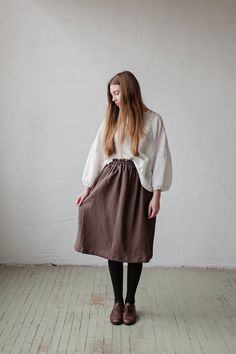 Below the knee skirt is made from 100% soft and washed linen. This Petticoat is perfect for wearing under dress or other skirt or can be worn alone. Match it with our tunics! Details: - Composition: 100% Oeko-Tex certified linen - Colour: chocolate brown - Elastic waist - Pockets - Size: One size/fits all - Medium weight linen - Linen care: machine wash gentle; tumble dry low, ironing optional - The price is for one skirt, other pictured items are not included Relaxed Fit Gathered Midi Skirt, Fall Daywear Flared Skirt, Relaxed Fit Flared Skirt For Fall, Relaxed Fit Long Skirt For Daywear, Fall Season Relaxed Fit Flared Skirt, Relaxed Fit Long Gathered Skirt, Relaxed Fit Midi Pencil Skirt For Daywear, Long Gathered Skirt With Relaxed Fit, Fall Flared Skirt For Daywear