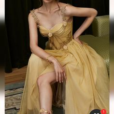 Questions? Leave A Comment Below! Old New York Prom Dresses, Neutral Color Prom Dresses, Gold And Black Dress Prom, Masquerade Theme Dresses, Gold New Years Dress, Maximalist Prom Dress, High Femme Outfits, Beauty And The Beast Inspired Dress, Prom Masquerade Theme Dress