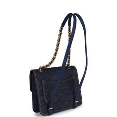 This Square Flap backpack is in Blue denim with antique gold tone hardware, a classic CC turnlock closure, a front slip pocket, a rear half moon pocket, an interwoven denim and chain top handle, and matching shoulder straps. The interior is lined in blue canvas and features a zipper pocket with Chanel pull and an open pocket below.Collection: 23S (RFID) Origin: ItalyCondition: New and never wornAccompanied by: Chanel box, Chanel dustbag, carebook, ribbon, and retail UPCMeasurements: 10" width x Luxury Denim Blue Shoulder Bag For Travel, Luxury Denim Blue Denim Bag, Classic Denim Bag For Everyday Use, Chic Blue Bag With Cc Turnlock Closure, Luxury Denim Blue Shoulder Bag, Luxury Denim Shoulder Bag For Travel, Denim Bags With Gold-tone Hardware For Everyday Use, Everyday Denim Bags With Gold-tone Hardware, Luxury Denim Shoulder Bag With Detachable Strap