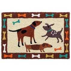 a rug with dogs and bones on it