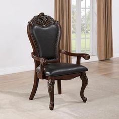 a black leather chair with ornate carvings on the armrests and back rests against a beige carpeted floor