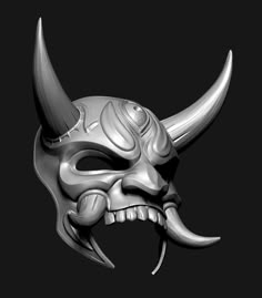 a silver mask with horns and fangs on it's face, against a black background