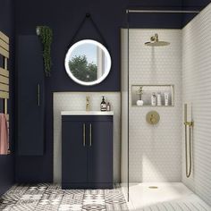 a bathroom with a sink, mirror and shower stall in it's dark blue color scheme