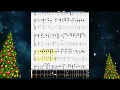 an animated christmas tree with musical notes and music sheets in front of it on a computer screen