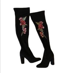 New Never Worn Zigi Soho Over Knee Boots Black Suede, Style Name Moze. Over The Knee High Heel Boot With Floral Embroidered Detail On The Side. Heel Is 4" Tall. Height Of Boot From Floor To Top Is 24". Zips Up To Mid Calf. Features: Faux Suede Upper Inside Zipper Closure Almond Toe Fabric Lining Cushioned Footbed Approx. 20" Shaft Height Approx. 14" Calf Circumference 4" Covered Heel Synthetic Sole Imported Black Heels With Floral Embroidery And Round Toe, Black Embroidered Heels For Spring, Black Embroidered Block Heel Heels, Black Boots With Floral Embroidery For Fall, Black Embroidered Block Heel, Black Heels With Floral Embroidery For Spring, Spring Black Heels With Floral Embroidery, Black Floral Embroidery Boots For Fall, Spring High Heel Boots With Floral Embroidery