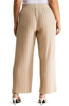 Plissé pleats add to the flowiness of these wide-leg crepe pants that will keep you comfortable all day. 29" inseam; 24" leg opening; 13 1/4" front rise; 18 1/2" back rise 100% polyester Unlined Hand wash, line dry Imported Wide Leg Pants With Accordion Pleats, Summer Wide Leg Bottoms With Accordion Pleats, Wide Leg Bottoms With Accordion Pleats For Summer, Accordion Pleated Wide Leg Bottoms For Summer, Beige Pleated Full-length Bottoms, Accordion Pleats Wide Leg Summer Bottoms, Pleated Wide Leg Bottoms With Relaxed Fit, Beige Pleated Wide Leg Bottoms, Chic Beige Bottoms With Accordion Pleats