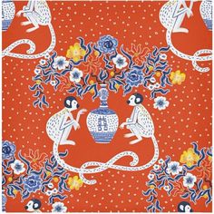 an orange and blue wall hanging with two mice on it's side, surrounded by flowers