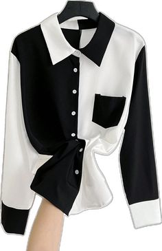 Trendy Collared Tops With Contrast Color, Black Patchwork Button-up Top, Trendy Black Blouse With Patchwork, Two-tone Color Block Long Sleeve Tops, White Shirt With Contrast Color For Spring, Chic White Color Block Blouse, Trendy Long Sleeve Color Block Shirt, White Collared Patchwork Blouse, White Collared Blouse With Patchwork